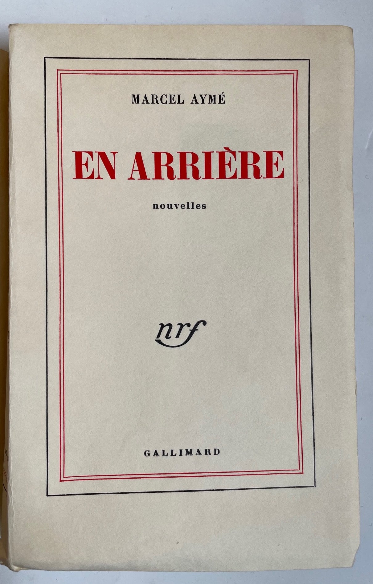 En arrière